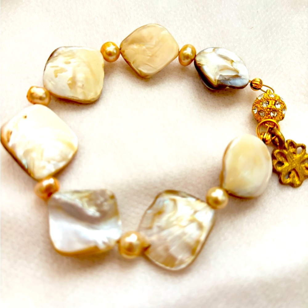 Elegant Gold and Cream Bracelet
